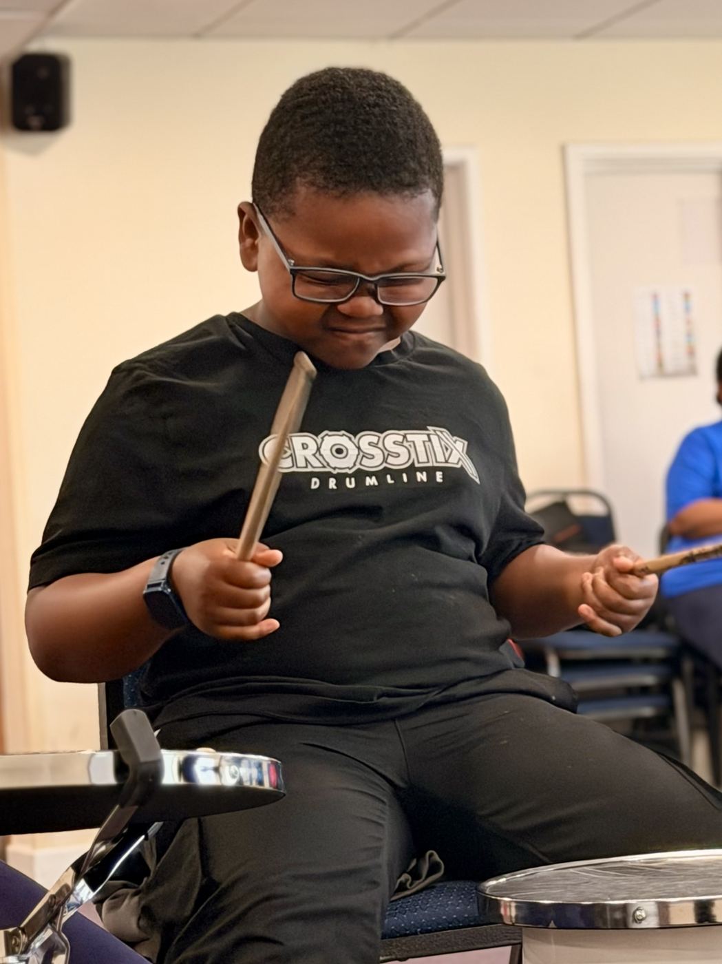An academy member laughing while playing