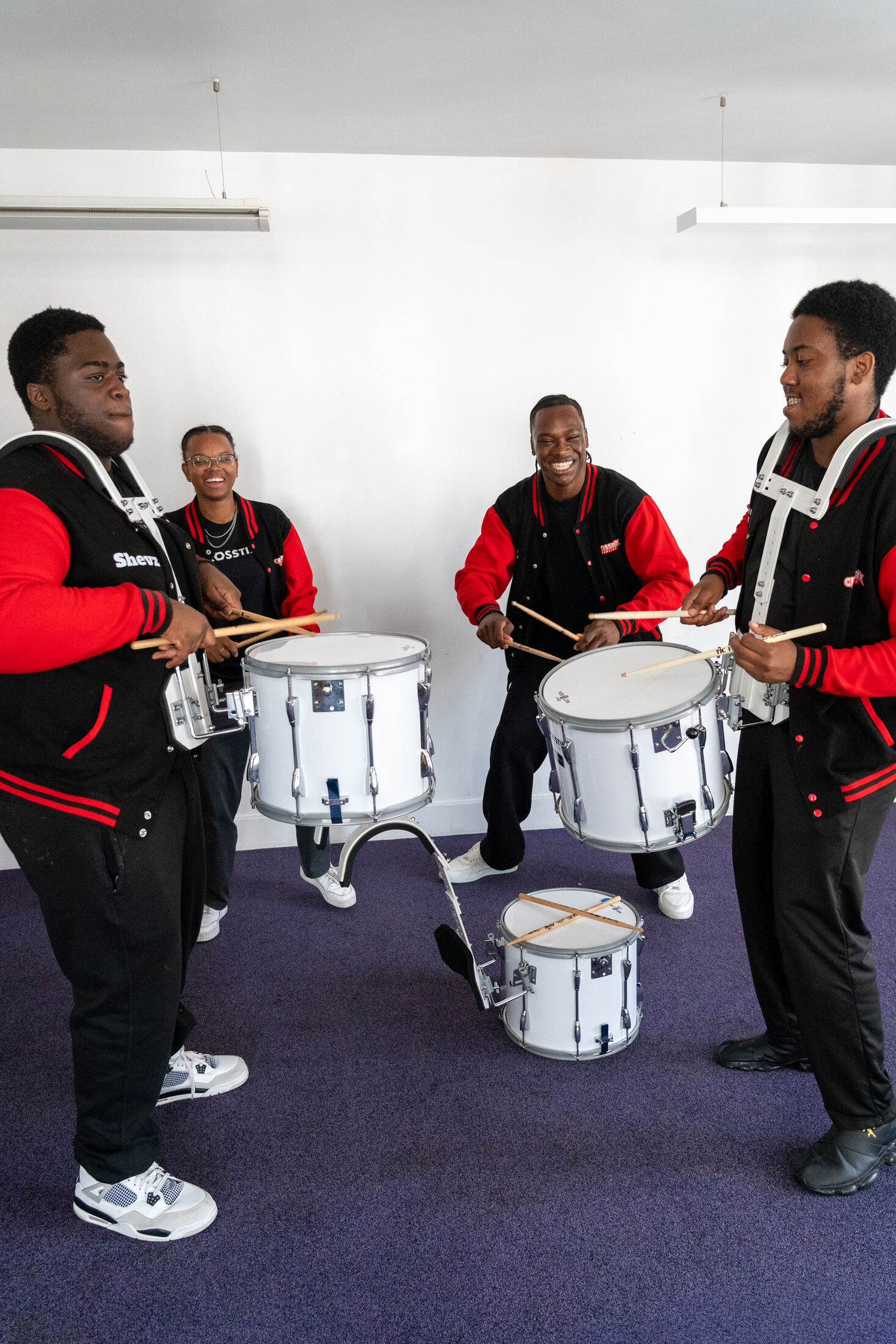 CrosStix members rehearsing indoors