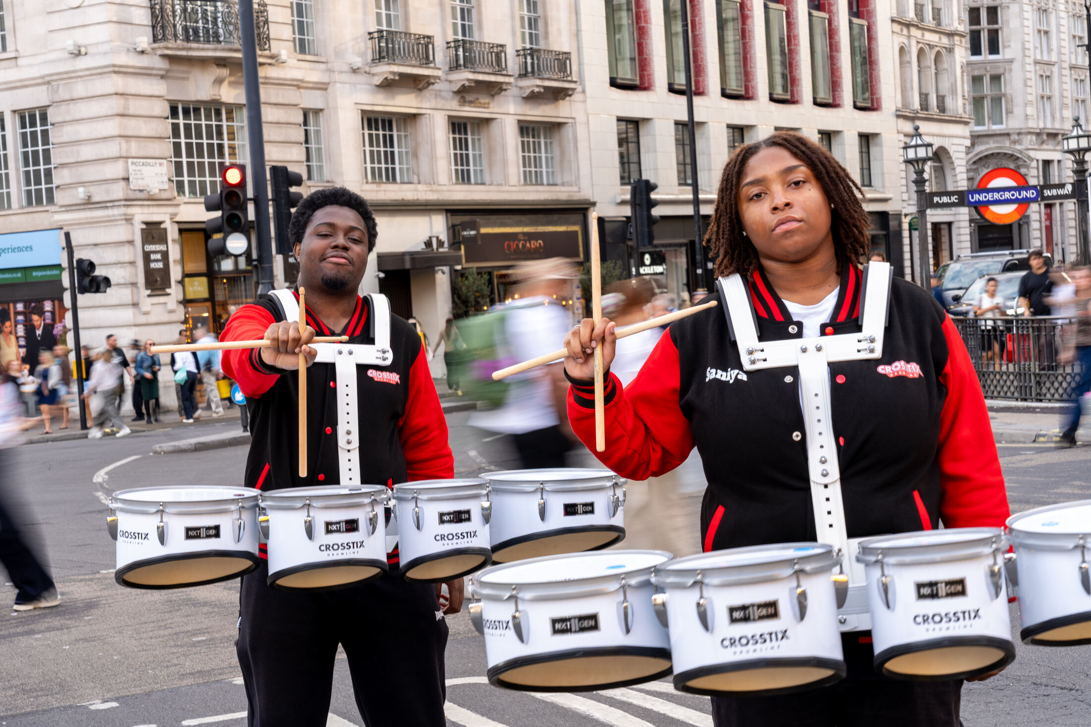 Two tenor drummers playing quads on a London street
