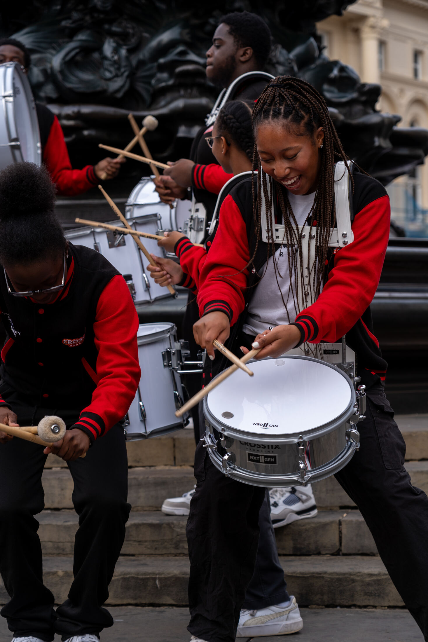 Drummers playing on the steps at Piccadilly Circus